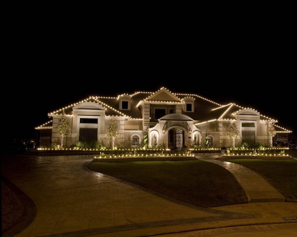 large white house with installed white lights